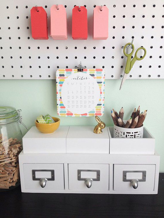 Organized cubicle decor with pegboards