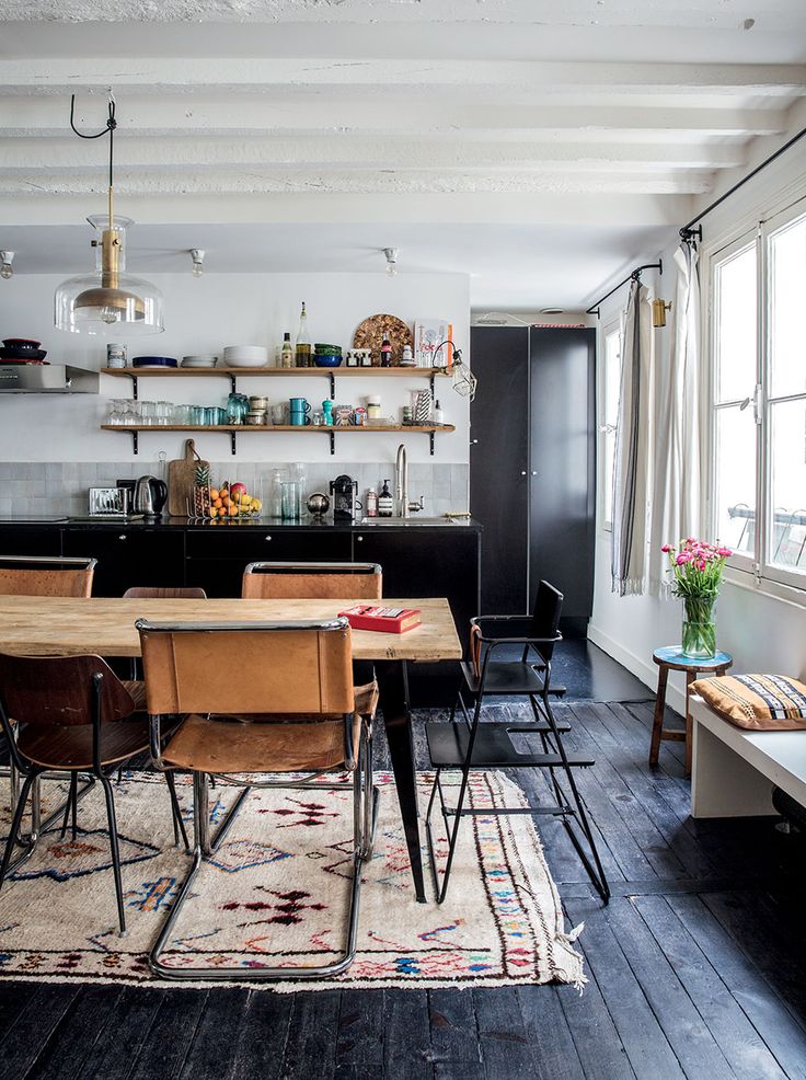 Black floor open space kitchen