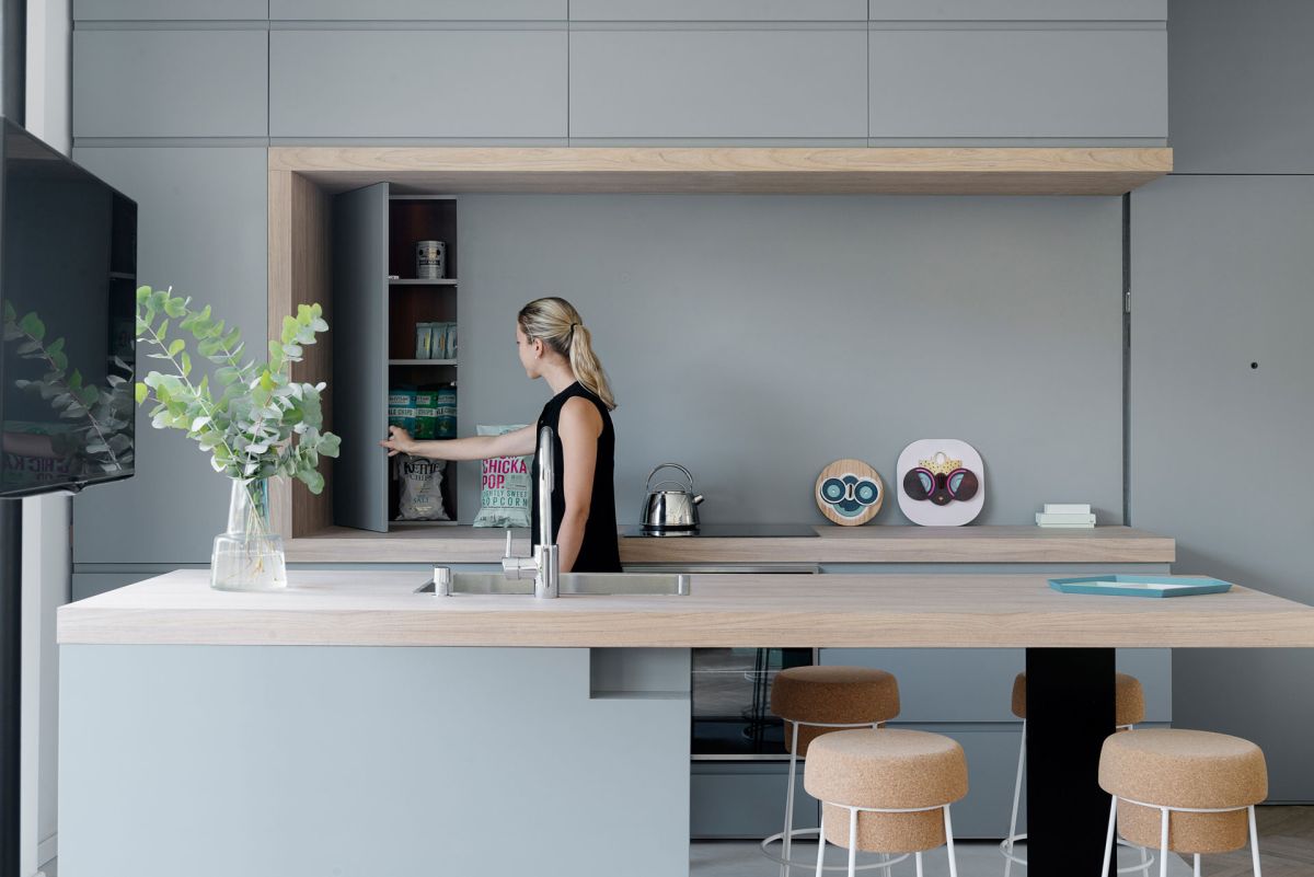 Small apartment remodel in Tel Aviv gray kitchen cabinets