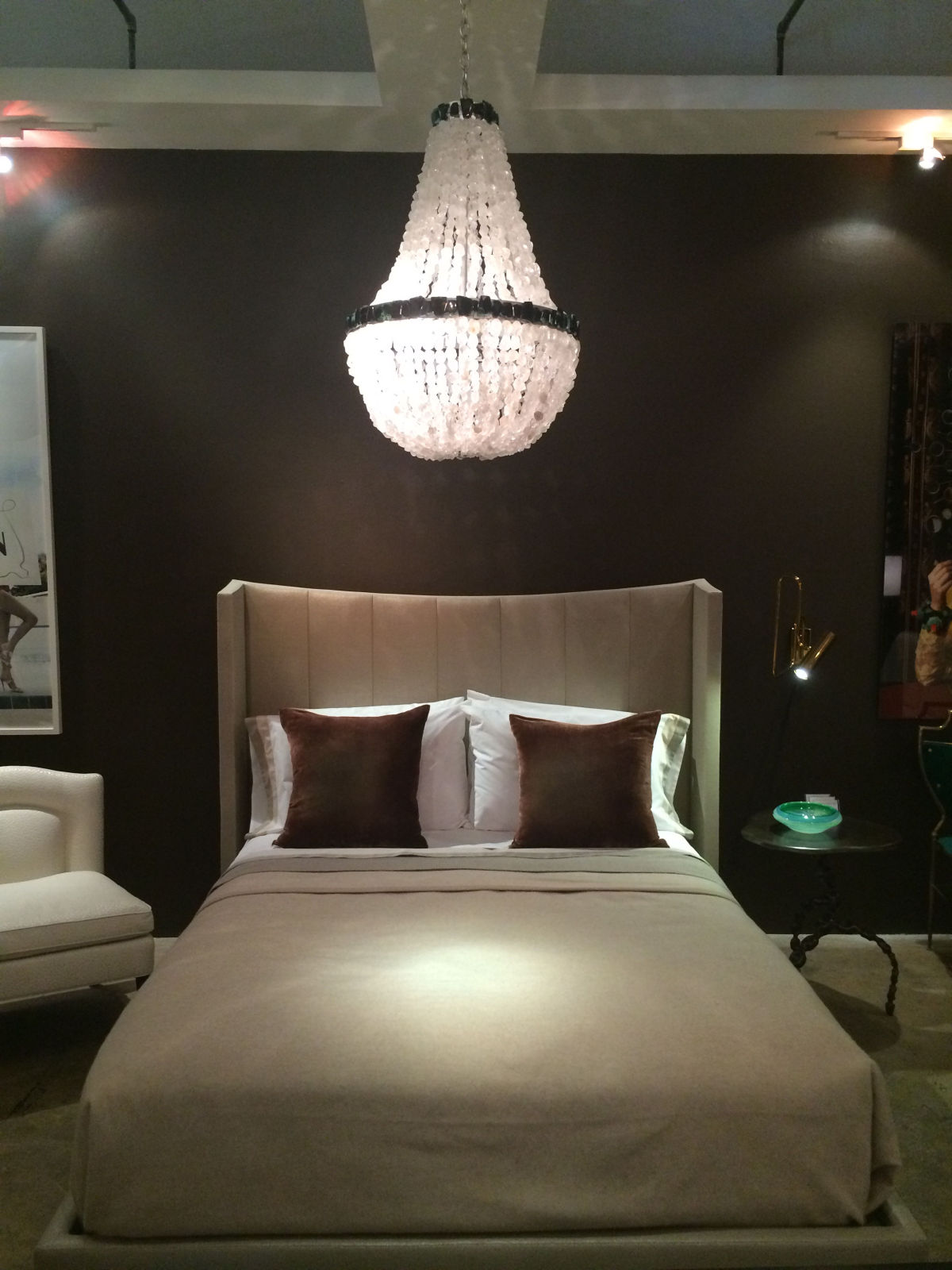 Bed setting with chandelier over