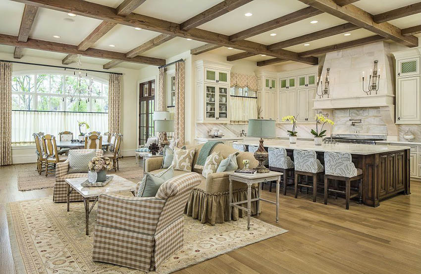 Open plan traditional–kitchen with cream cabinets and engineered oak flooring