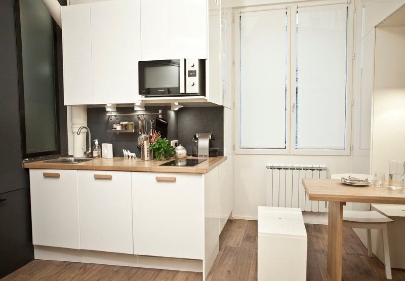 Белая мини кухня в квартире панельного дома