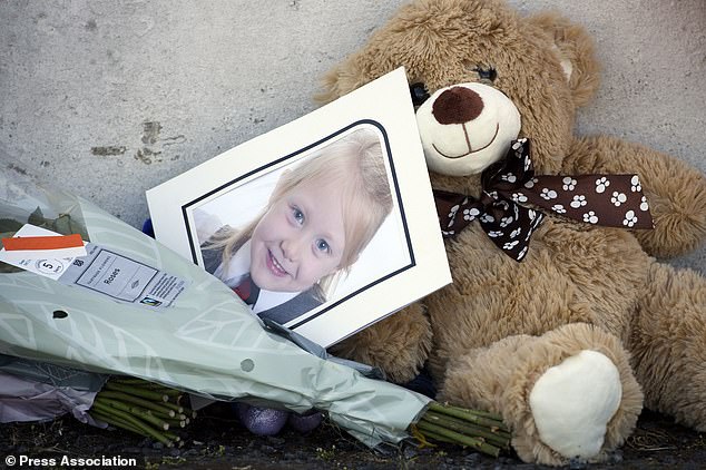 A school photograph of Alesha MacPhail was placed among tributes last July after her death