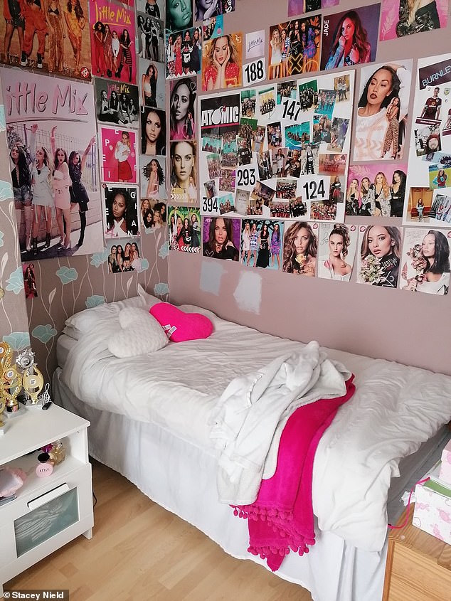 Stacey Nield, 36, from Accrington, revealed how daughter Evie, 12, transformed her poster-filled room (pictured, Evie