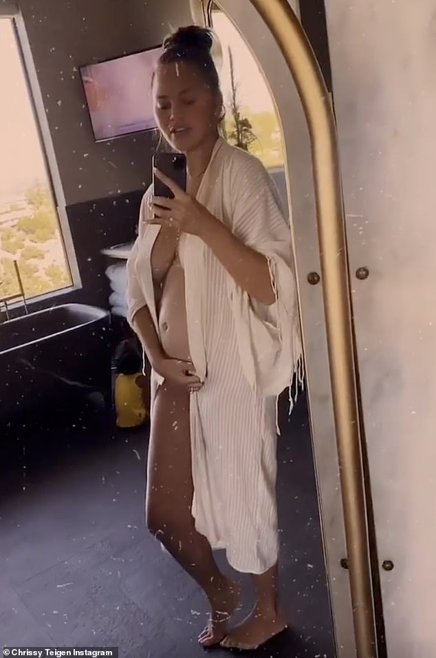 Bumping along nicely: Chrissy Teigen, 34, marveled at how quickly her baby bump is expanding, in a very candid Instagram Story posted to her account on Wednesday