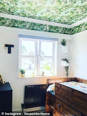 A jungle paper ceiling has transformed young Toby