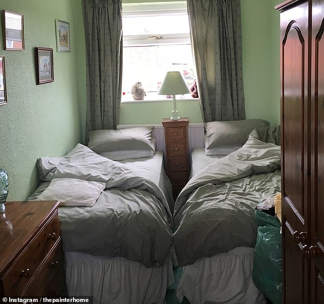 Before the house was redone by the Painters, one room was filled with two single beds and dark wood furnishings