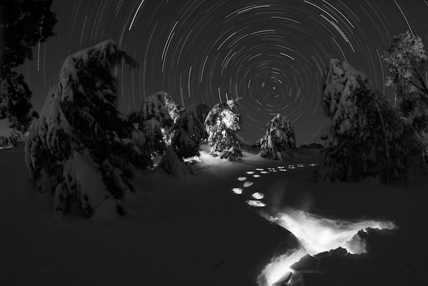 Snow and star trail at night