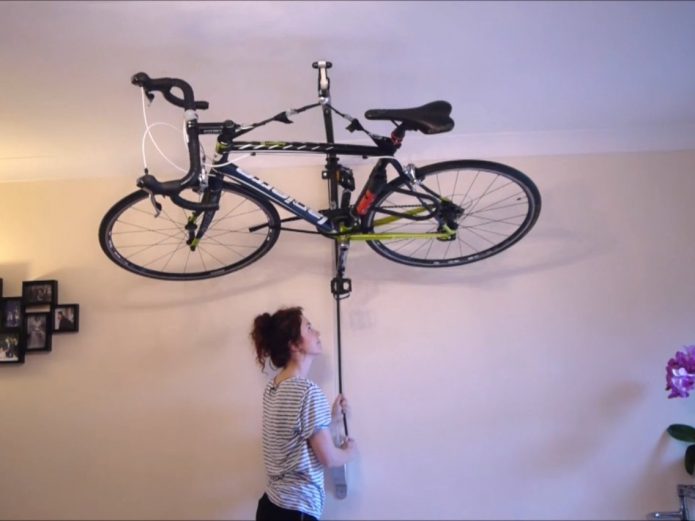 Хранение велосипеда на креплениях