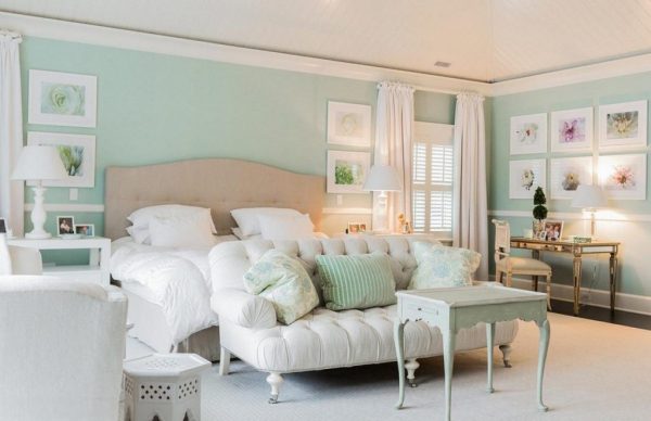 a-glamorous-mint-wall-paint-idea-for-lavish-bedroom-with-stylish-brown-bed-and-white-bedding-with-antique-wooden-tables-and-classy-white-sofa-and-fascinating-wall-decors-1024x663