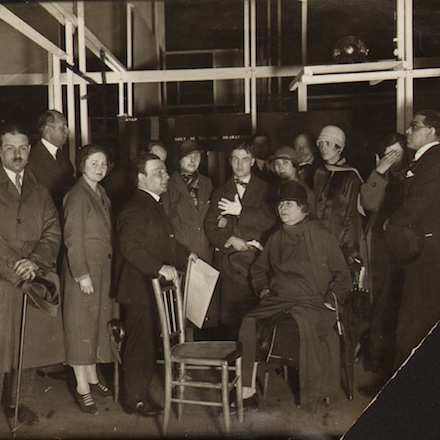 Friedrich Kiesler with a crowd of visitors to his Raumstadt display, 1925