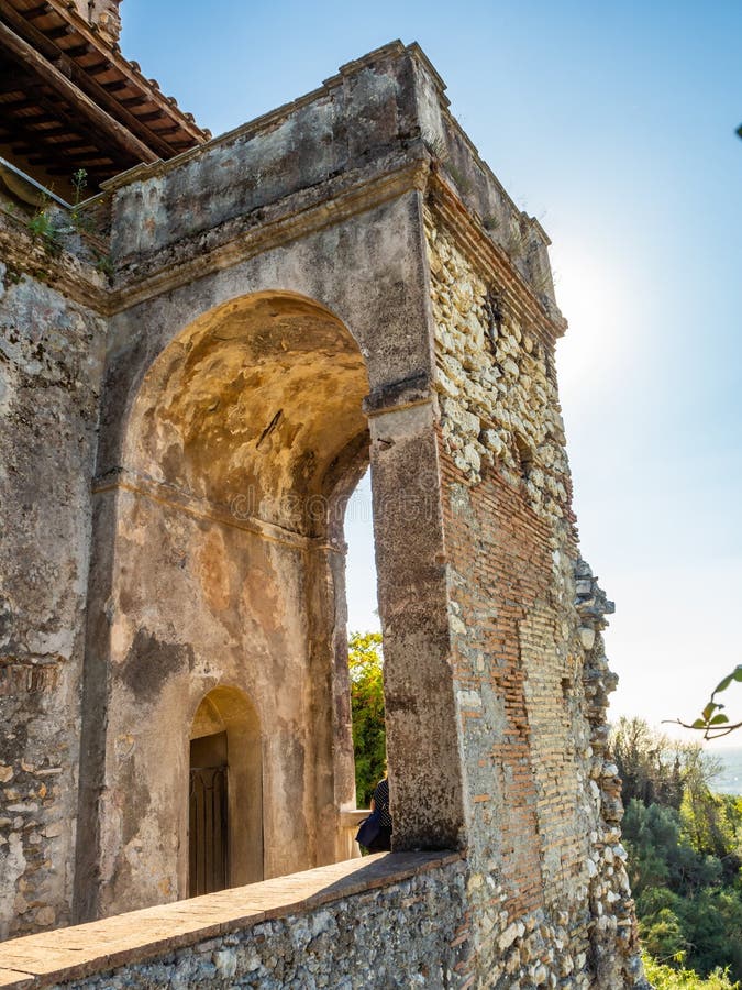 Ancient arch with a balcony in the garden at Villa D`Este in Tivoli, Italy.  stock photography