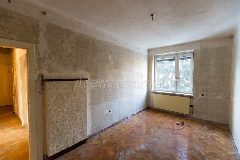 Apartment in need of renovation. Old apartment, symbol photo apartment for resolution, housing and rehabilitation needs royalty free stock photo