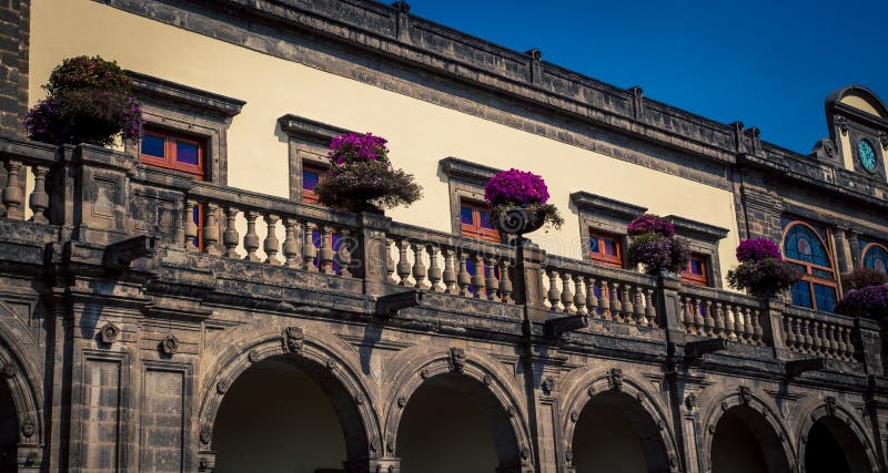 Arch and balcony in mexico city. Arch and balcony with a railing in mexico city stock images