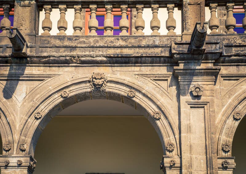 Arch and balcony in mexico city. Arch and balcony with a railing in mexico city stock photography