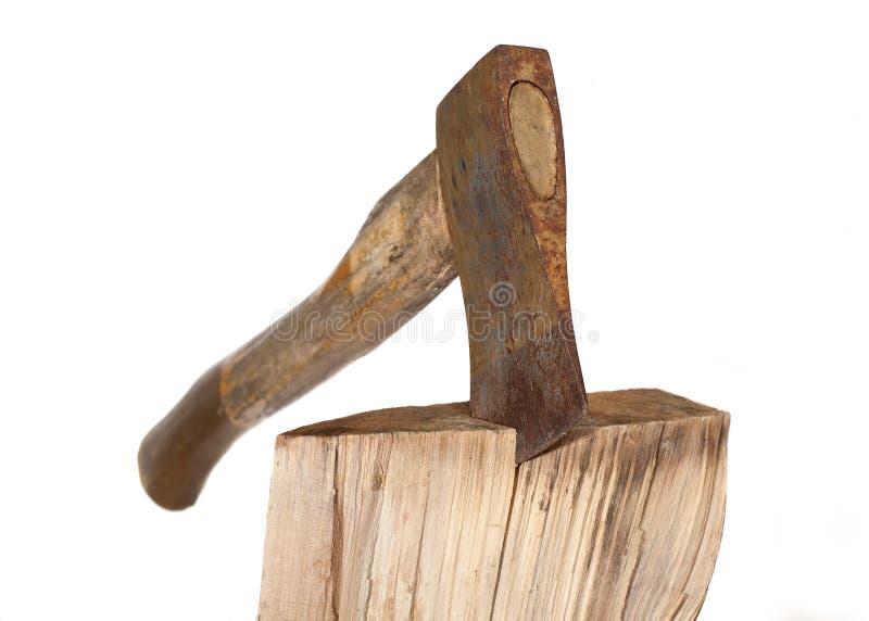 Axe Chopping Firewood. A rusty axe being used to chop firewood stock photos