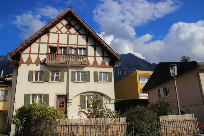 Beautiful cozy European houses surrounded by a garden. In Liechtenstein stock photos