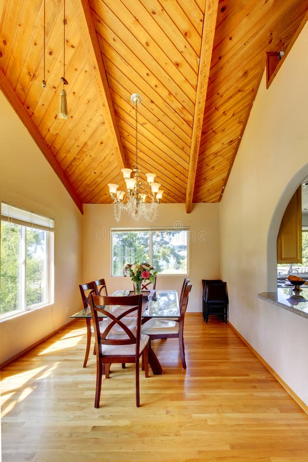 Beautiful dining area with high vaulted ceiling stock images