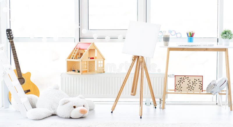 Beautiful interior of children`s room. Beautiful interior of cozy children`s room with toys royalty free stock images
