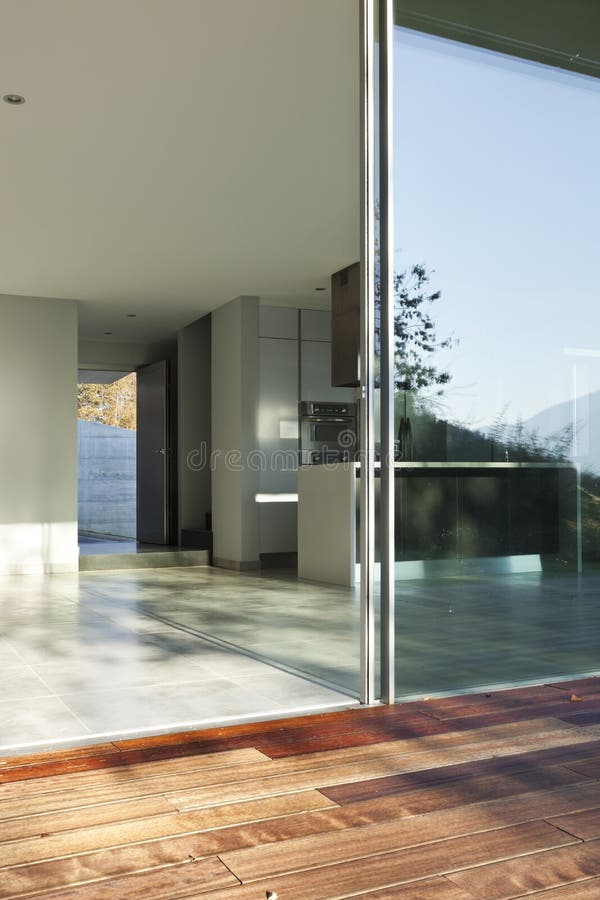 Beautiful modern house. View of the interior from the patio royalty free stock photography Beautiful modern house. View of the interior from the patio royalty free stock photography
