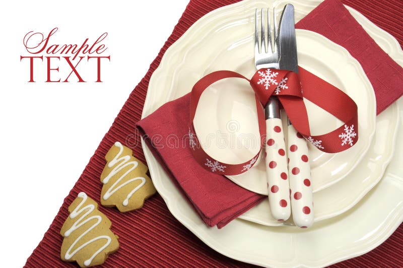 Beautiful red theme festive Christmas dining table place setting royalty free stock photos