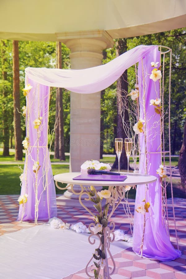 Beautiful wedding gazebo in summer park stock images