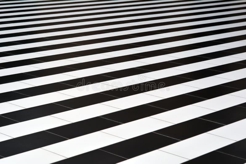 Black-and-white tiles on the floor royalty free stock photo