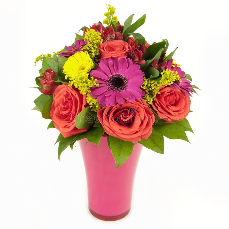 Bouquet of pink and yellow flowers in vase isolated on white. Background stock photos