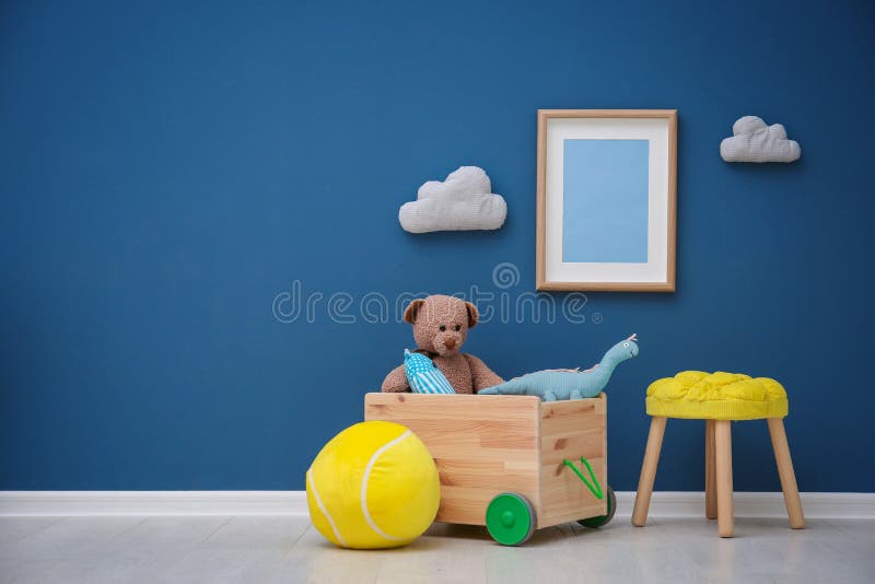 Children`s room with bright color wall. Interior details stock photo