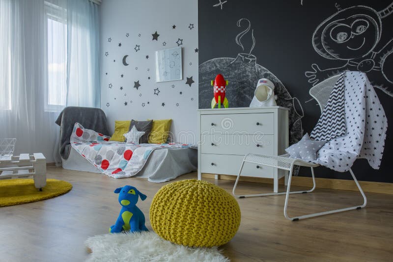 Children`s room interior. Cozy children`s room interior with blackboard wall and toys stock photography