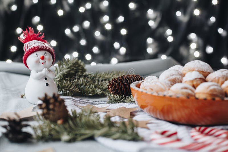 Christmas composition with a toy snowman, paper stars, cones, ch stock images Christmas composition with a toy snowman, paper stars, cones, ch stock images