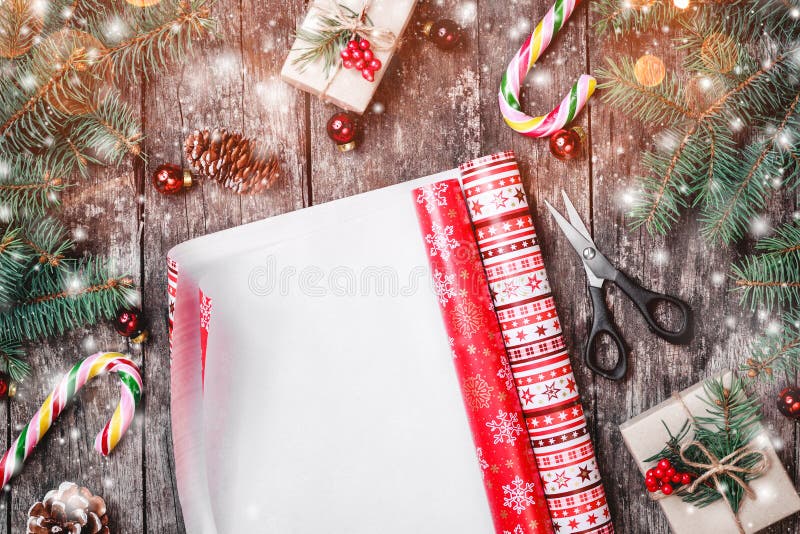 Christmas composition with xmas wrapping, Fir branches, gifts, pine cones, red decorations on wooden background. royalty free stock images Christmas composition with xmas wrapping, Fir branches, gifts, pine cones, red decorations on wooden background. royalty free stock images