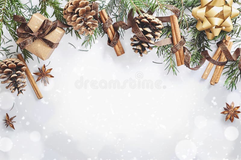 Christmas and New Year composition. Gift box with ribbon, fir branches with cones, star anise, cinnamon on white background royalty free stock image Christmas and New Year composition. Gift box with ribbon, fir branches with cones, star anise, cinnamon on white background royalty free stock image