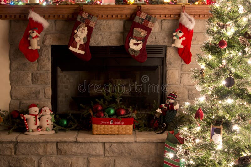 Christmas Tree And Fireplace With Christmas Stockings. Christmas Tree And Fireplace Decorations royalty free stock images