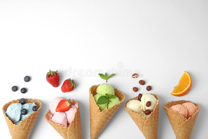 Composition with delicious ice creams in waffle cones on white background royalty free stock images Composition with delicious ice creams in waffle cones on white background royalty free stock images