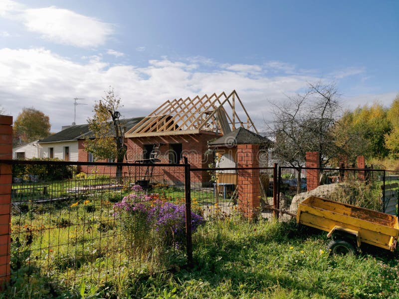 Construction of a small house in the village. Roof construction royalty free stock photos