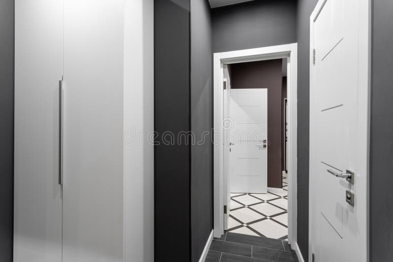 The corridor between the rooms. inexpensive family room. Hotel standart two bedroom. simple and stylish interior. Family room. Hotel standart two bedroom. simple stock photography