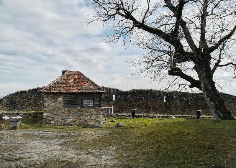 Cottage inside. Of a fortifoed church walls stock photo