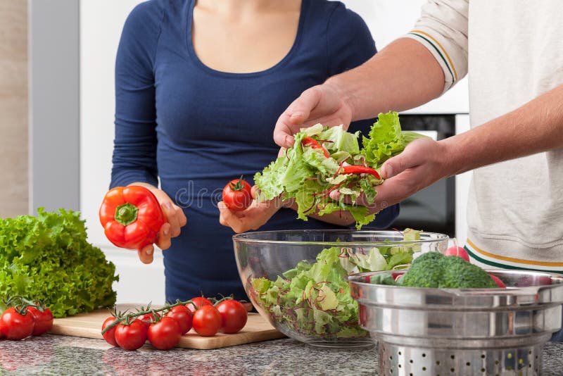 Couple cooking stock image