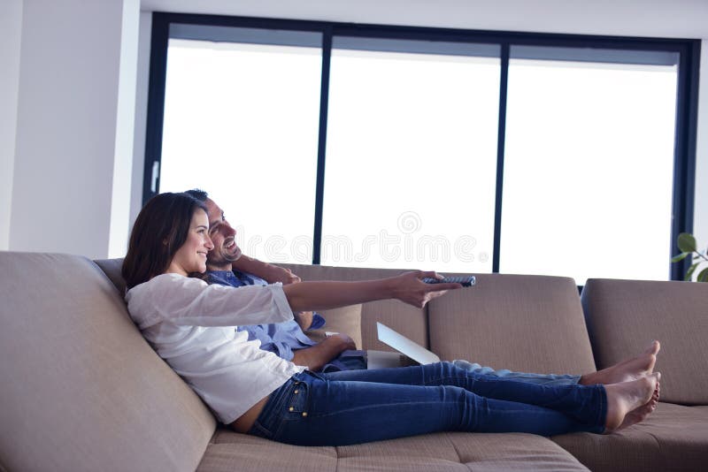 Couple on sofa royalty free stock image