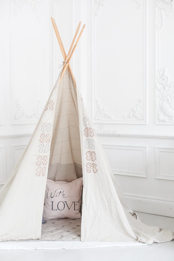 Cozy bright interior of the children`s room with a wigwam. Cozy bright interior of the children`s room with a wigwam royalty free stock image