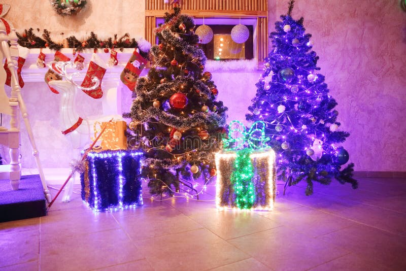 Cozy living room decorated for children`s holiday on Christmas eve. Holiday concept stock photography
