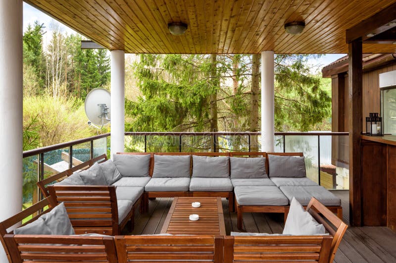 Cozy terrace in country house or hotel. Moscow - May 2, 2018: Cozy terrace in country house or hotel in summer Interior design of patio in rural style in stock photo