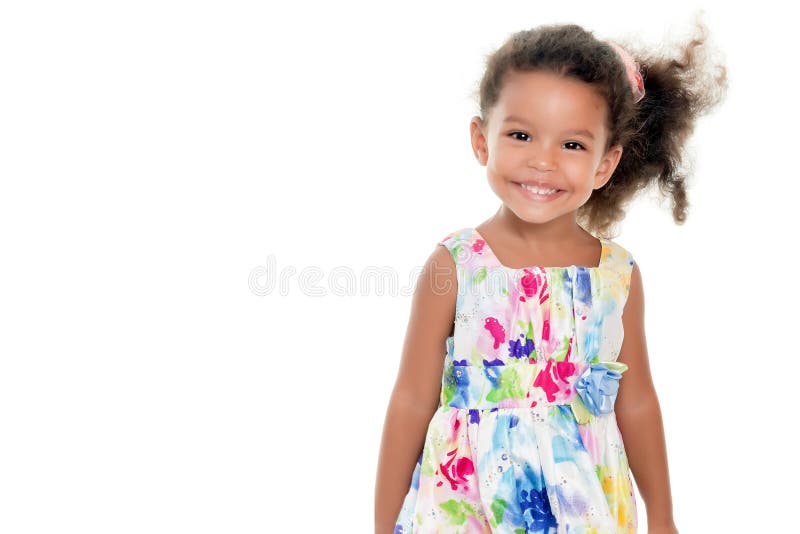 Cute small girl wearing a flowers summer dress royalty free stock photos