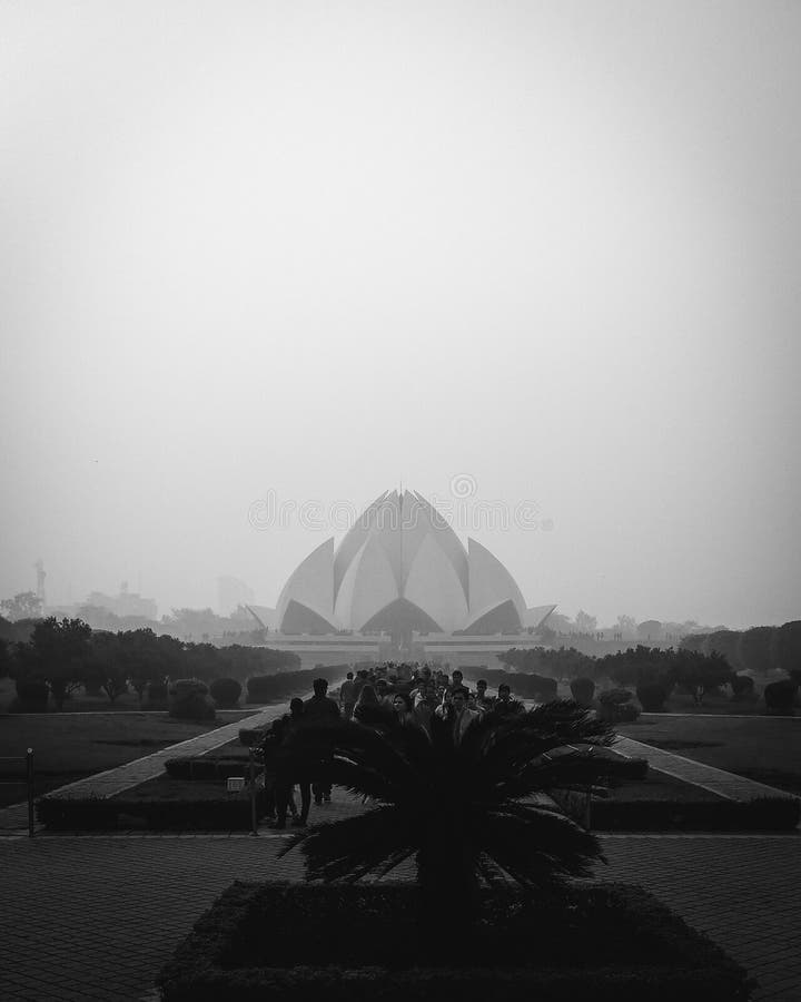 Delhi, India - Lotus Temple, Bahai house for worship. Unique design landmark building. Idea from nature. Black and white. Monochrome royalty free stock images