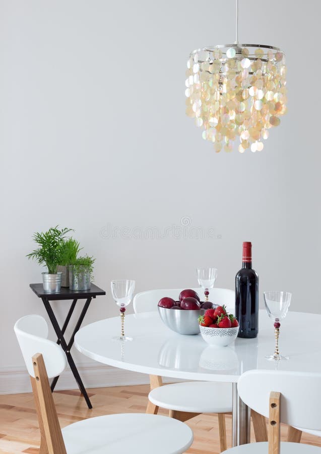 Dining room decorated with beautiful chandelier stock photo