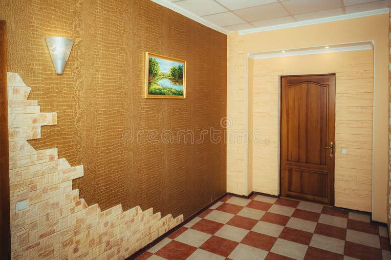 Entrance to the apartment. Grand design - corridor and main door. Grand design - corridor and main door. Modern entrance door house. the entrance hall with door royalty free stock image