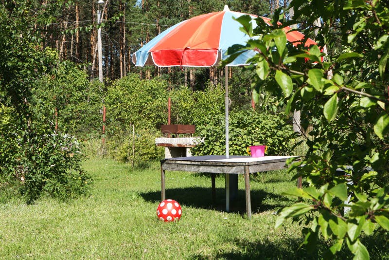 Vacation in the summer at the dacha with children. Family vacation in the summer at the dacha with children stock image