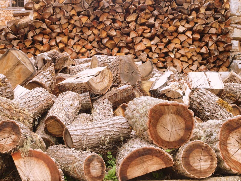 Firewood. A large wall of firewood stock photo