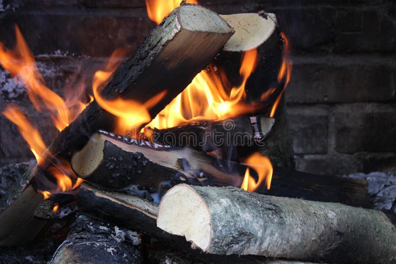 Firewood. Glowing woods flame fire log firewood royalty free stock photography